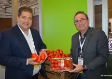Dino Dilaudo and Tony Cappelli with Westmoreland-TopLine Farms show greenhouse grown San Marzano-style Roma tomatoes. They are available in bulk as well as packaged.